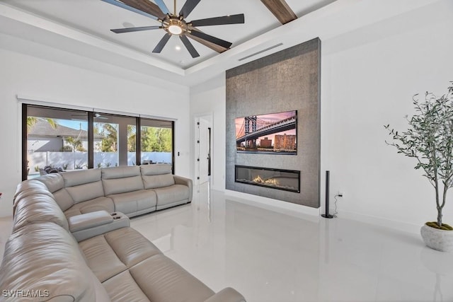 living room with a fireplace, recessed lighting, visible vents, a high ceiling, and a ceiling fan