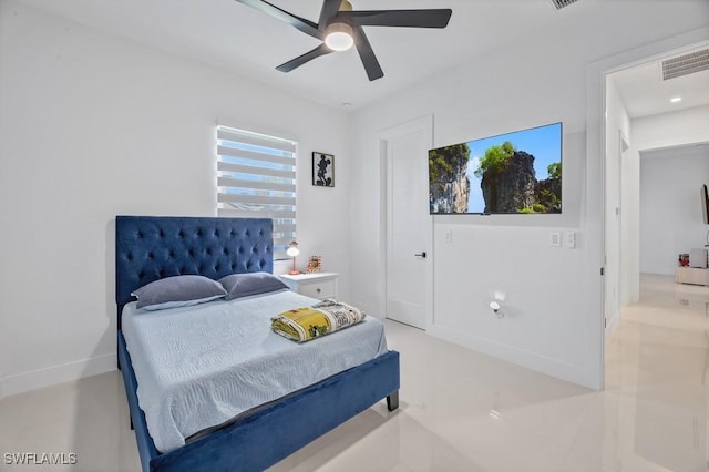 bedroom with ceiling fan, visible vents, and baseboards