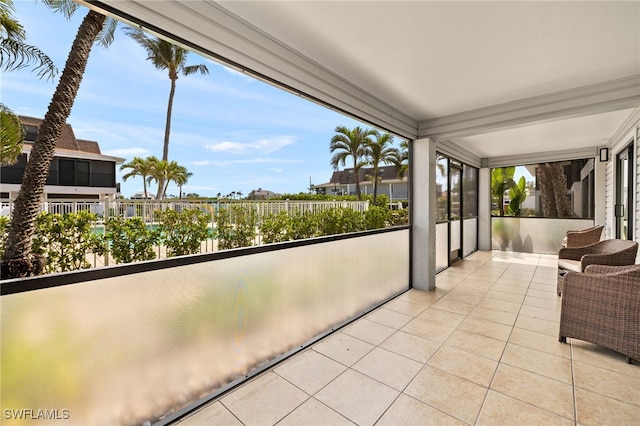 balcony featuring a sunroom