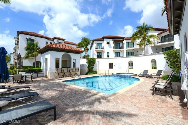 1530 5th Ave S Unit 208C, Naples, FL 34102 - view of pool with a patio area, a pool with connected hot tub, and a gazebo