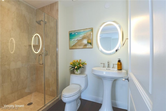 1530 5th Ave S Unit 208C, Naples, FL 34102 - full bathroom with a shower stall, toilet, and baseboards