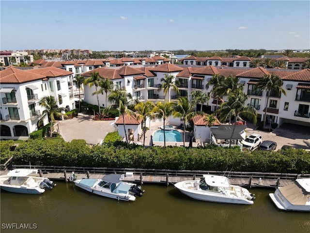 1530 5th Ave S Unit 208C, Naples, FL 34102 - aerial perspective of suburban area with a large body of water and a pool
