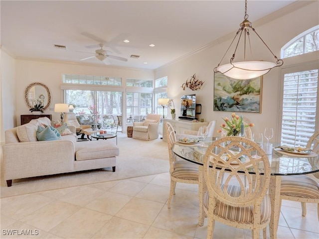 dining area featuring light tile patterned floors, recessed lighting, visible vents, and crown molding