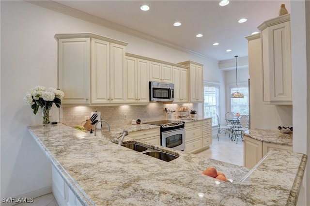 kitchen with stainless steel appliances, crown molding, a sink, and tasteful backsplash