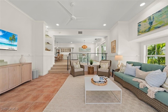 living area featuring ornamental molding, recessed lighting, ceiling fan, and light tile patterned floors