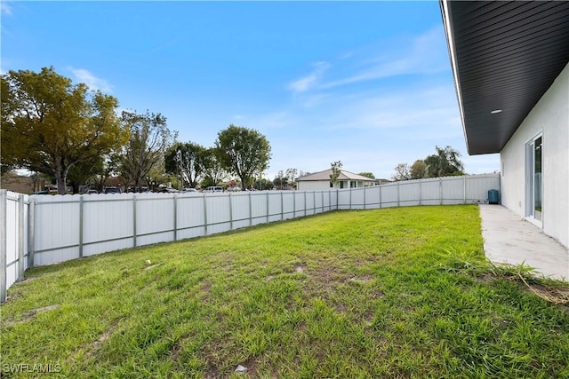 view of yard featuring a fenced backyard