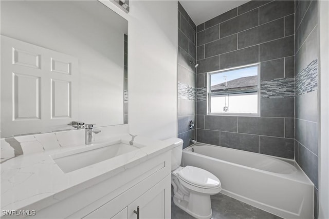 bathroom featuring vanity, shower / tub combination, and toilet