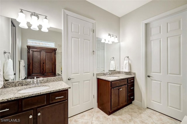12121 Chrasfield Chase, Fort Myers, FL 33913 - full bathroom featuring tile patterned floors and two vanities