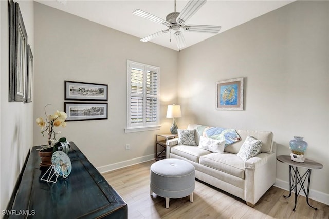 12121 Chrasfield Chase, Fort Myers, FL 33913 - living area featuring light wood-type flooring and ceiling fan