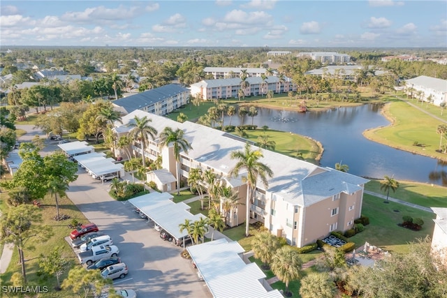 birds eye view of property featuring a residential view and a water view