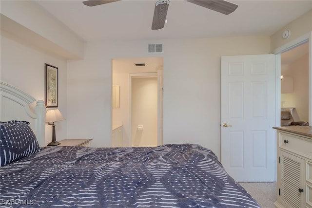 bedroom with visible vents, carpet flooring, and ceiling fan