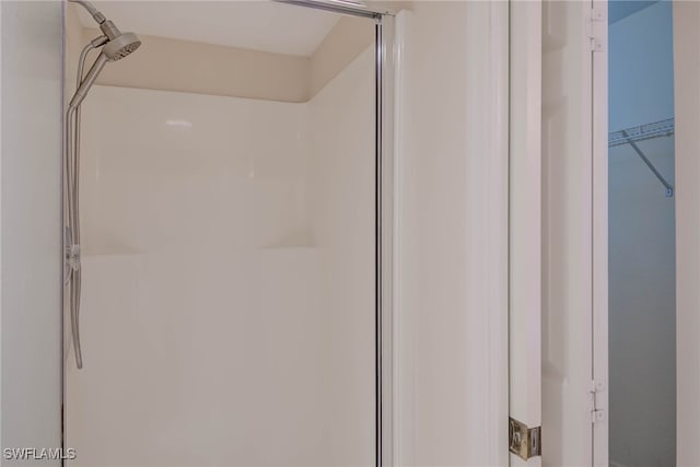 interior space featuring a stall shower