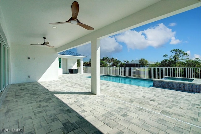 view of pool featuring a fenced in pool, a patio area, ceiling fan, fence, and an in ground hot tub