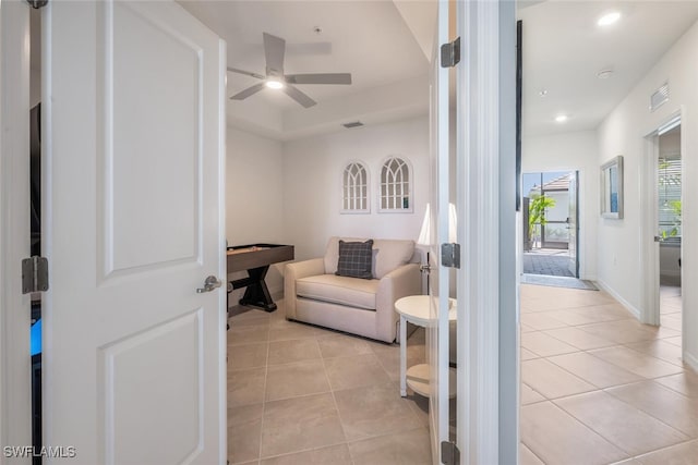 sitting room featuring visible vents, recessed lighting, light tile patterned floors, baseboards, and ceiling fan