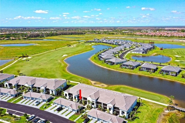 birds eye view of property featuring a residential view, view of golf course, and a water view