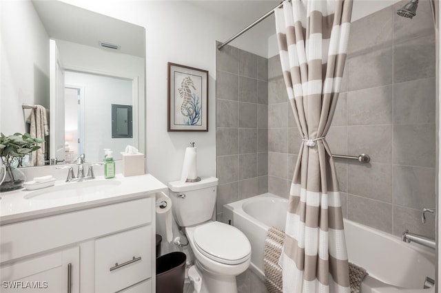 full bath with vanity, visible vents, electric panel, shower / bath combo, and toilet