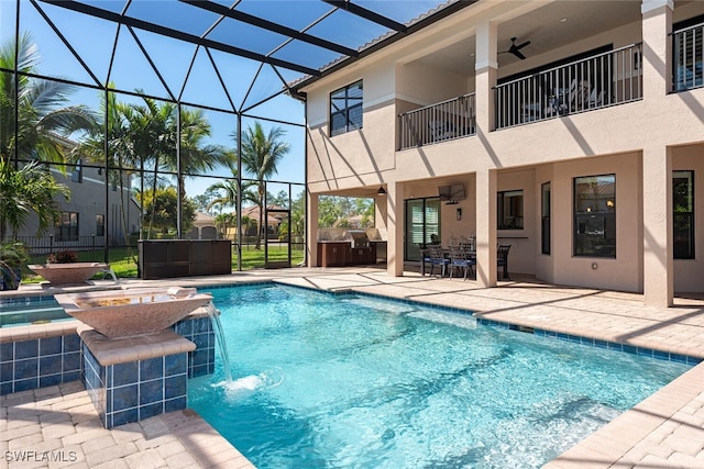 outdoor pool featuring a lanai, a patio area, and ceiling fan