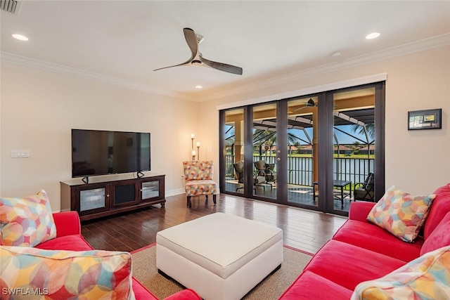 living room featuring recessed lighting, ornamental molding, ceiling fan, and hardwood / wood-style floors