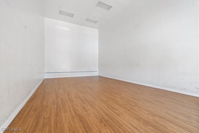 unfurnished room featuring light wood-style floors