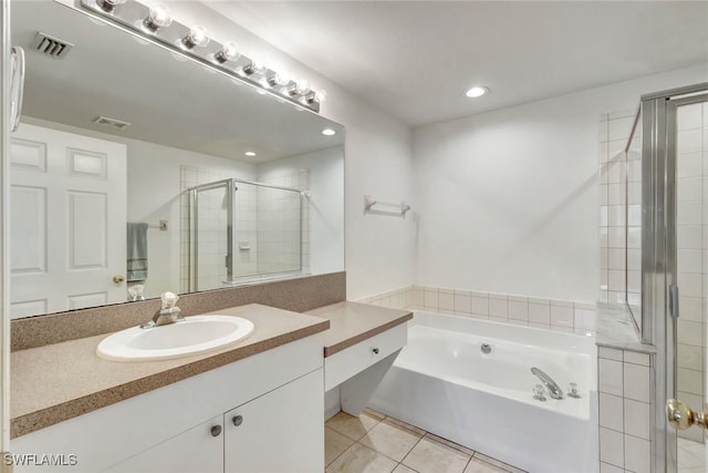 full bath with visible vents, tile patterned floors, vanity, a shower stall, and a bath