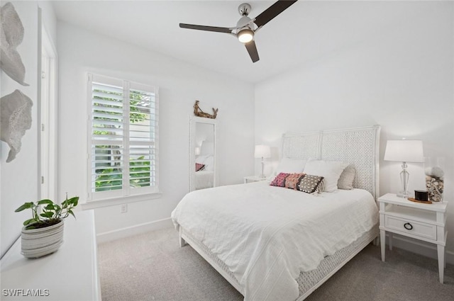 3171 Quilcene Ln, Naples, FL 34114 - carpeted bedroom with baseboards and a ceiling fan