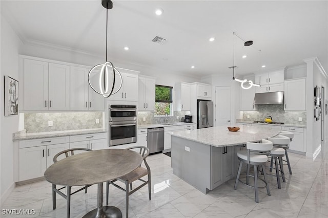 3171 Quilcene Ln, Naples, FL 34114 - kitchen featuring appliances with stainless steel finishes, light marble finish floors, a sink, ornamental molding, and tasteful backsplash