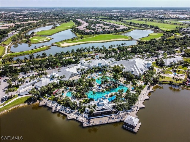 3171 Quilcene Ln, Naples, FL 34114 - aerial perspective of suburban area featuring a pool area, a nearby body of water, and a local golf course