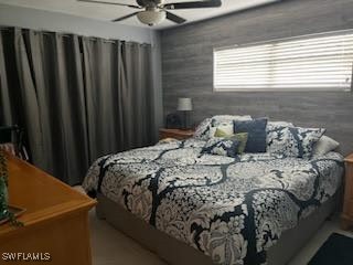 dining room with wood finished floors and ceiling fan