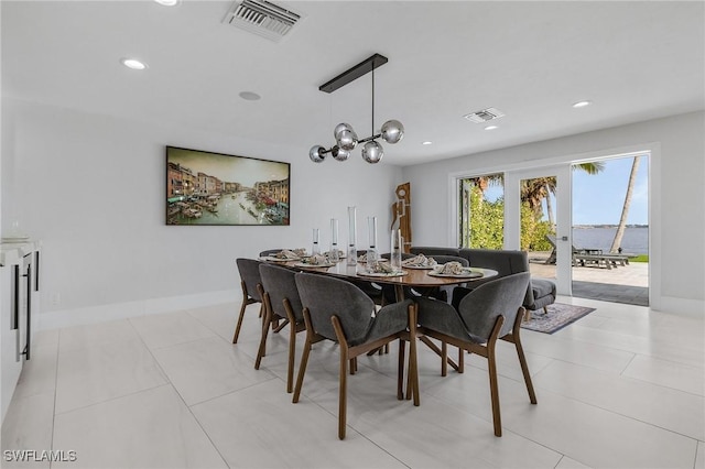 dining room featuring recessed lighting, visible vents, a notable chandelier, and baseboards