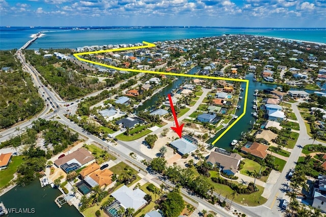 aerial view featuring a water view and a residential view