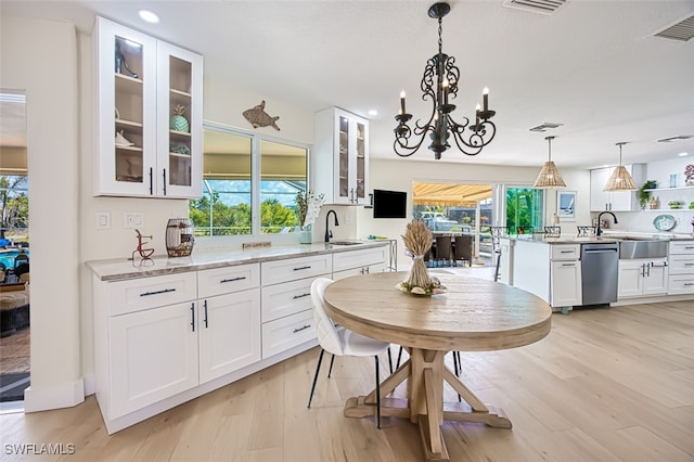 dining room featuring a chandelier, visible vents, recessed lighting, and light wood-type flooring