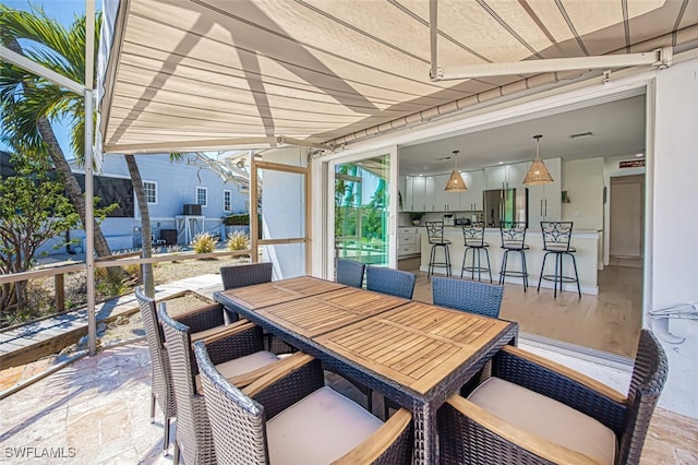 view of patio / terrace featuring outdoor dining space