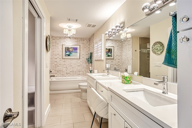 full bath with a garden tub, visible vents, and a sink