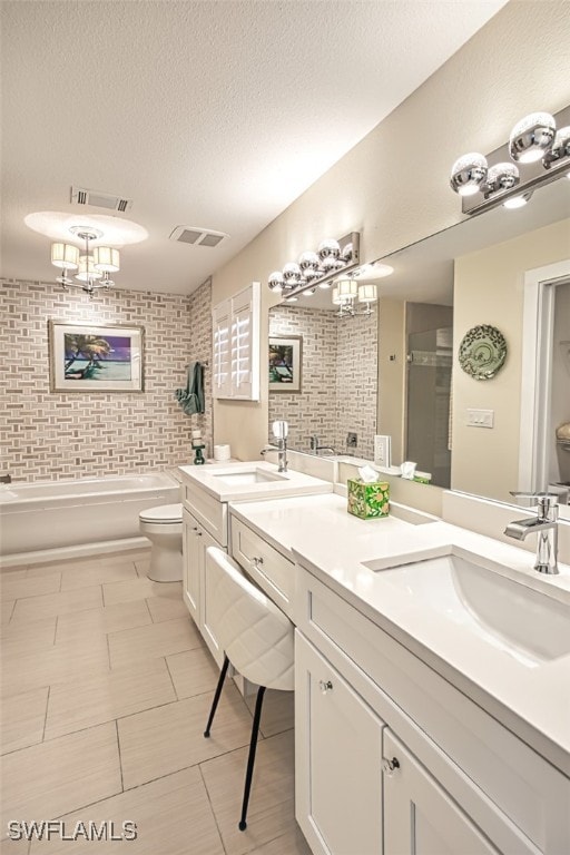 full bathroom with a sink, visible vents, and a shower with shower door