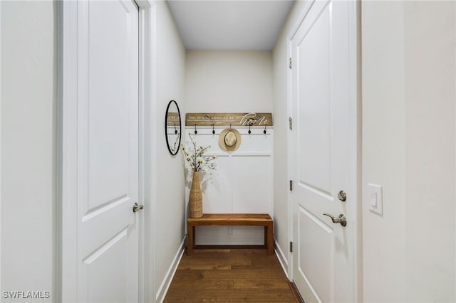 entryway with baseboards and dark wood finished floors