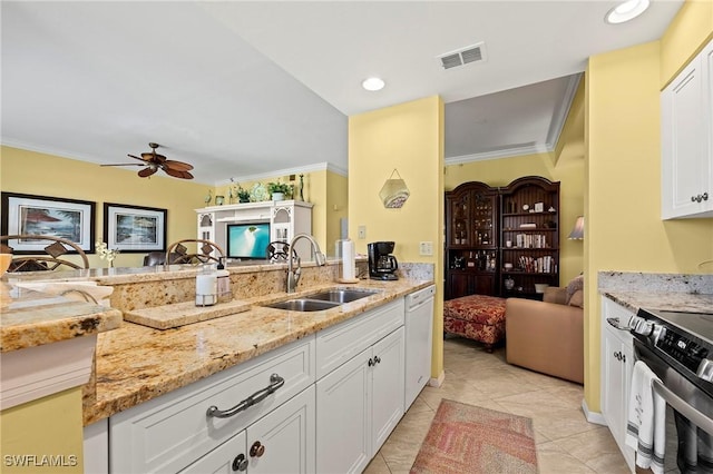 kitchen with crown molding, visible vents, a sink, white dishwasher, and stainless steel range with electric stovetop