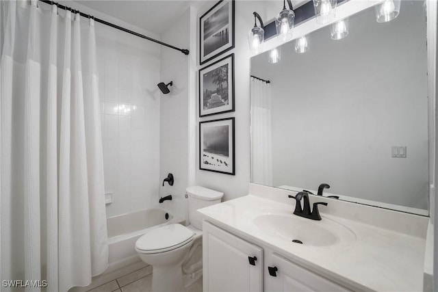 bathroom with shower / bath combo with shower curtain, vanity, toilet, and tile patterned floors