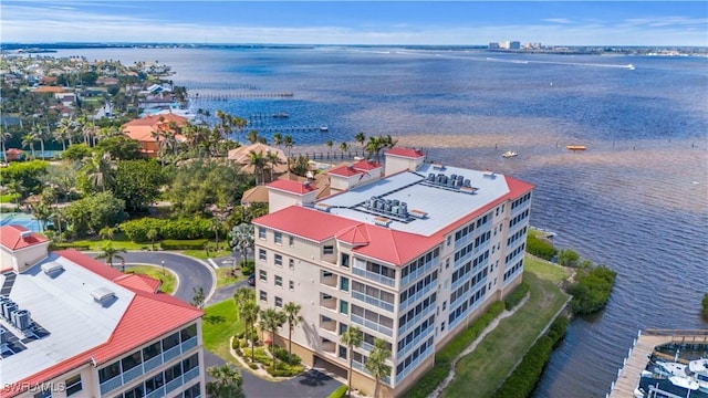 bird's eye view with a water view