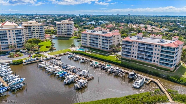 birds eye view of property featuring a water view