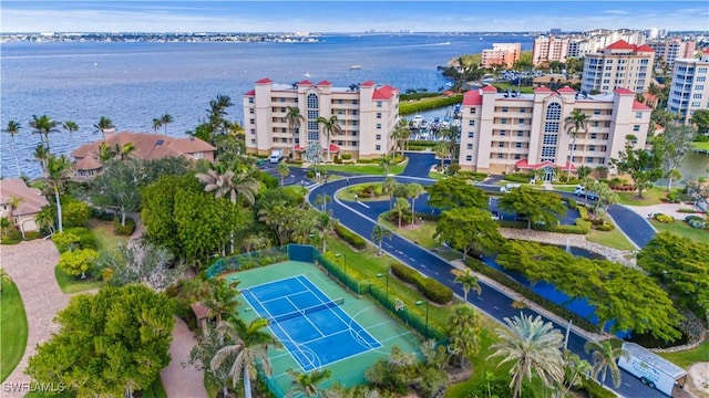 birds eye view of property featuring a water view