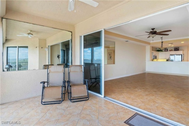 view of patio featuring ceiling fan