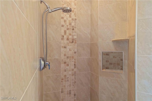 details featuring a tile shower