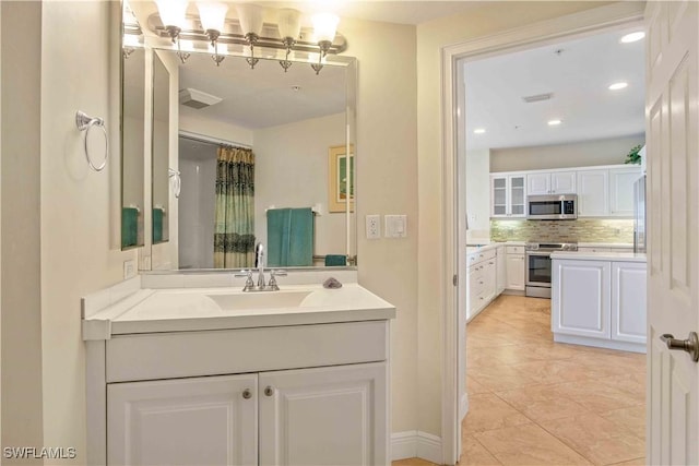 full bathroom with recessed lighting, tasteful backsplash, visible vents, and vanity