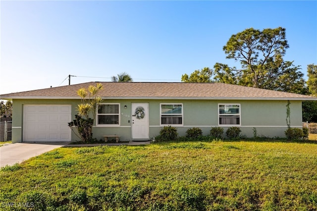 single story home featuring stucco siding, concrete driveway, an attached garage, a front yard, and fence