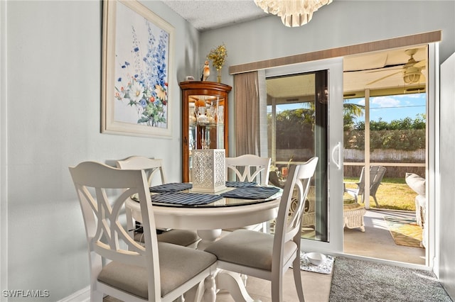 dining room featuring a textured ceiling