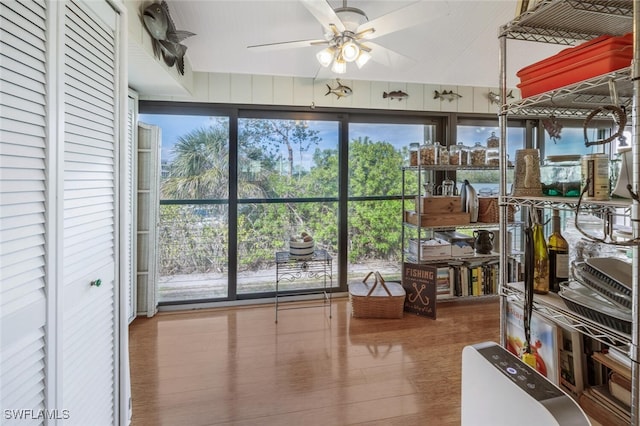 interior space featuring ceiling fan