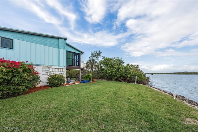 view of yard with a water view