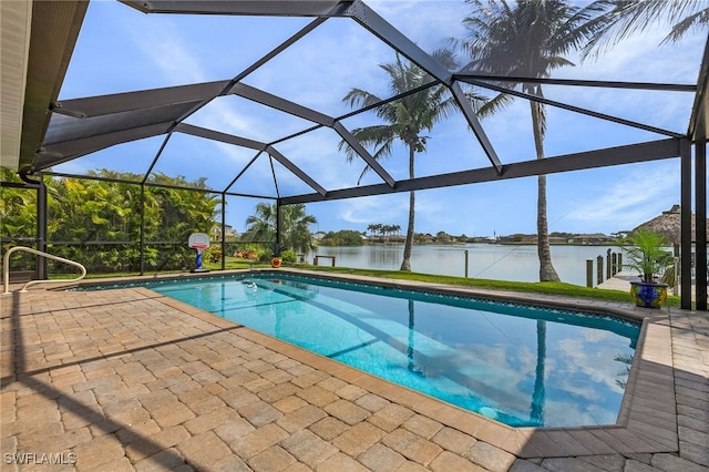 outdoor pool with a patio, a water view, and a lanai