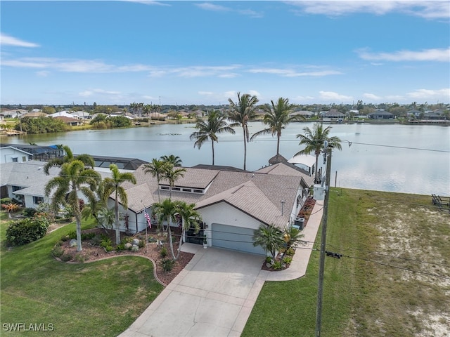 birds eye view of property featuring a water view