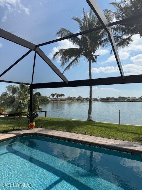 pool featuring a water view and a lanai